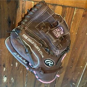 Rawlings brown / pink leather fast pitch / softball glove. EUC!   Left handed.